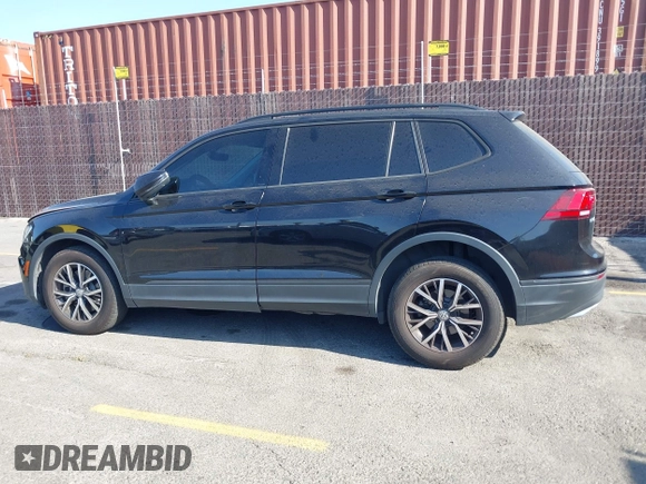 2021 Volkswagen Tiguan S with VIN 3VV1B7AX2MM142289, listed as a IAAI auction lot 42403346 with 71,182 mi miles and . Bid and sale history available at DreamBid. Image 14.