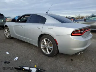 2022 Dodge Charger SXT with VIN 2C3CDXJG1NH162393, listed as a Copart auction lot 84976544 with 5,312 mi miles and Salvage Title. Bid and sale history available at carsss.com. Image 2.