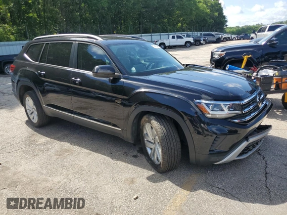 2021 Volkswagen Atlas SEL with VIN 1V2ER2CA5MC542810, listed as a Copart auction lot 57243245 with 104,505 mi miles and Salvage title. Bid and sale history available at DreamBid. Image 4.