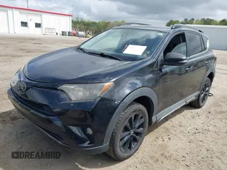 2018 Toyota RAV4 XLE with VIN 2T3RFREV1JW697044, listed as a IAAI auction lot 41891412 with 140,145 mi miles. Bid and sale history available at carsss.com. Image 18.