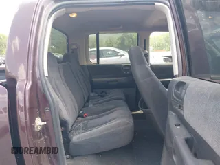 2004 Dodge Dakota SLT with VIN 1D7HG48NX4S649522, listed as a IAAI auction lot 42580132 with 124,037 mi miles and . Bid and sale history available at DreamBid. Image 8.