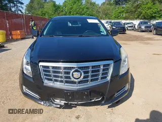2013 Cadillac XTS Premium z VIN 2G61S5S34D9127996, wystawiony jako IAAI lot #41978539 z przebiegiem 185 157 mil mil oraz . Historia ofert i sprzedaży dostępna na DreamBid. Obrazek 6.
