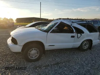 2001 GMC Jimmy SLS Comfort/Convenience with VIN 1GKCT18W31K181320, listed as a Copart auction lot 73676454 with 135,419 mi miles and Salvage Title. Bid and sale history available at carsss.com. Image 1.