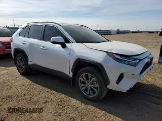2022 Toyota RAV4 Hybrid XLE Premium with VIN JTMB6RFV1ND521761, listed as a Copart auction lot 54263055 with 46,391 mi miles and Salvage title. Bid and sale history available at DreamBid. Image 4.