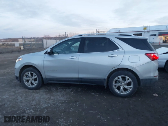 2019 Chevrolet Equinox Premier with VIN 2GNAXXEV1K6244691, listed as a IAAI auction lot 41164317 with 89,604 mi miles and . Bid and sale history available at DreamBid. Image 14.
