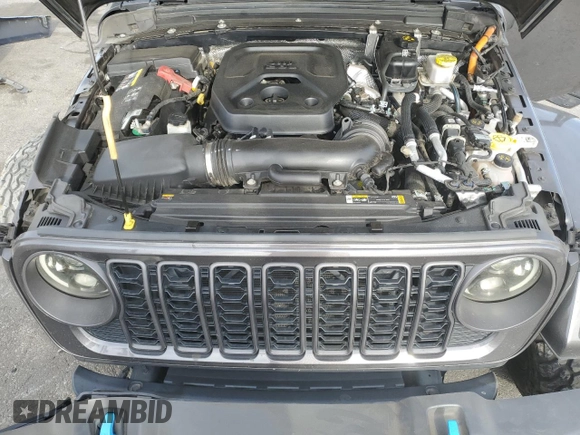 2024 Jeep Wrangler Sport S with VIN 1C4RJXN69RW147521, listed as a Copart auction lot 47298575 with 55,477 mi miles and Salvage Title. Bid and sale history available at DreamBid. Image 12.