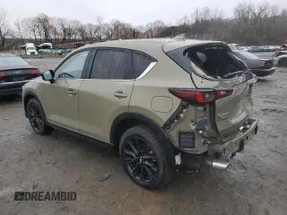 2024 Mazda CX-5 2.5 Carbon Turbo with VIN JM3KFBAY5R0419375, listed as a Copart auction lot 82000304 with 7,247 mi miles and Salvage Title. Bid and sale history available at carsss.com. Image 2.
