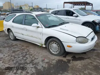 1999 Mercury Sable z VIN 1MEFM58U5XG646668, wystawiony jako IAAI lot #42058309 z przebiegiem 191 764 mil mil oraz . Historia ofert i sprzedaży dostępna na DreamBid. Obrazek 1.