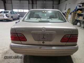 2001 Mercedes-Benz E-Class AWD with VIN WDBJF82J71X043474, listed as a Copart auction lot 45512025 with 59,571 mi miles and Salvage Title. Bid and sale history available at carsss.com. Image 6.
