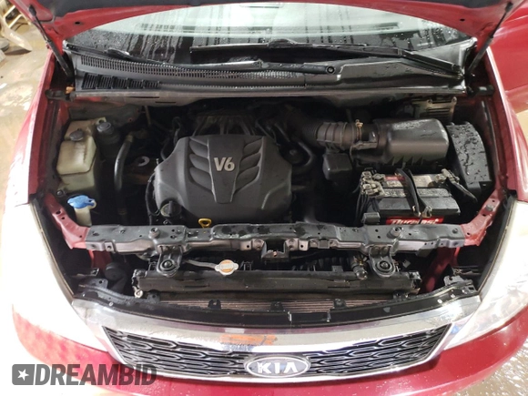 2012 Kia Sedona LX with VIN KNDMG4C71C6432577, listed as a Copart auction lot 49298405 with 205,983 mi miles and Salvage Title. Bid and sale history available at carsss.com. Image 12.