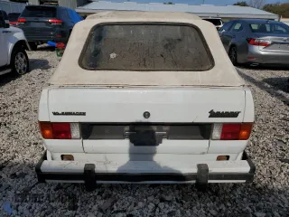 1984 Volkswagen Rabbit z VIN WVWCA0151EK009645, wystawiony jako Copart lot #78178084 z przebiegiem Nie podano mil oraz Tytuł czysty. Historia ofert i sprzedaży dostępna na DreamBid. Obrazek 6.