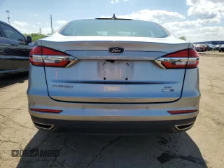 2020 Ford Fusion SE z VIN 3FA6P0T93LR179435, wystawiony jako Copart lot #56985465 z przebiegiem 43 188 mil mil oraz Szkoda całkowita • Salvage title. Historia ofert i sprzedaży dostępna na DreamBid. Obrazek 6.