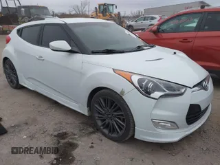 2013 Hyundai Veloster RE:MIX with VIN KMHTC6AD6DU135325, listed as a IAAI auction lot 41089948 with 238,459 mi miles and . Bid and sale history available at DreamBid. Image 1.