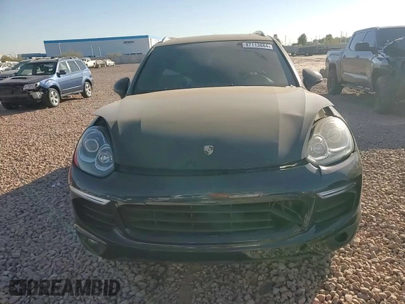 2016 Porsche Cayenne z VIN WP1AA2A27GLA08049, wystawiony jako Copart lot #87113884 z przebiegiem 125 603 mil mil oraz Szkoda całkowita • Salvage title. Historia ofert i sprzedaży dostępna na DreamBid. Obrazek 10.