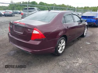 2012 Ford Fusion SE z VIN 3FAHP0HA4CR429812, wystawiony jako IAAI lot #42217492 z przebiegiem 207 215 mil mil oraz . Historia ofert i sprzedaży dostępna na DreamBid. Obrazek 4.