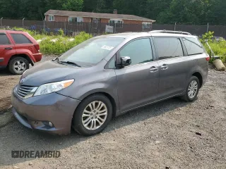 2016 Toyota Sienna XLE with VIN 5TDYK3DC8GS707311, listed as a Copart auction lot 59023735 with 239,418 mi miles and Salvage title. Bid and sale history available at DreamBid. Image 1.