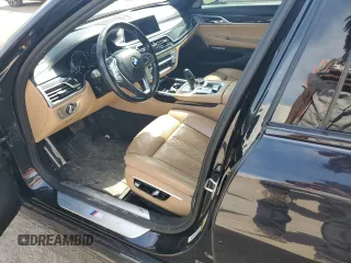 2016 BMW 7 Series 750i z VIN WBA7F0C57GGM20650, wystawiony jako Copart lot #57177555 z przebiegiem 113 632 mil mil oraz Tytuł czysty. Historia ofert i sprzedaży dostępna na DreamBid. Obrazek 7.