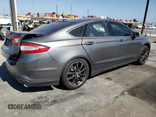 2013 Ford Fusion SE Hybrid z VIN 3FA6P0LUXDR362711, wystawiony jako Copart lot #57060425 z przebiegiem 155 031 mil mil oraz Szkoda całkowita • Salvage title. Historia ofert i sprzedaży dostępna na DreamBid. Obrazek 3.