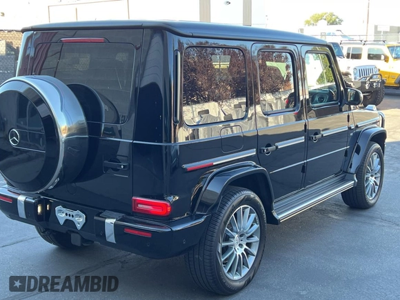 2023 Mercedes-Benz G 550 with VIN W1NYC6BJ6PX474872, listed as a Copart auction lot 74717934 with 18,299 mi miles and Clean Title. Bid and sale history available at DreamBid. Image 4.