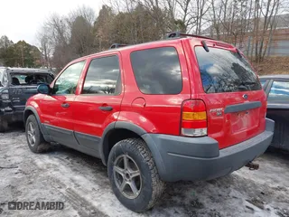 2002 Ford Escape Limited with VIN 1FMCU04132KB53687, listed as a IAAI auction lot 41468556 with 63,875 mi miles. Bid and sale history available at carsss.com. Image 3.