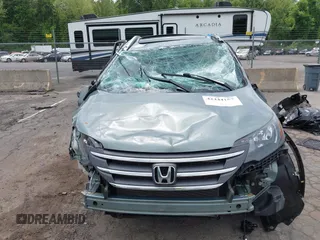 2012 Honda CR-V EX-L with VIN 2HKRM4H78CH601054, listed as a IAAI auction lot 42444157 with 113,491 mi miles and . Bid and sale history available at DreamBid. Image 13.
