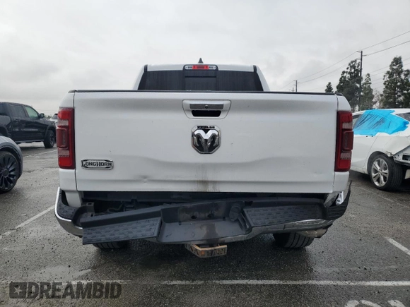 2020 Ram 1500 with VIN 1C6RREKG4LN401571, listed as a Copart auction lot 43620245 with 99,979 mi miles and Salvage title. Bid and sale history available at DreamBid. Image 6.