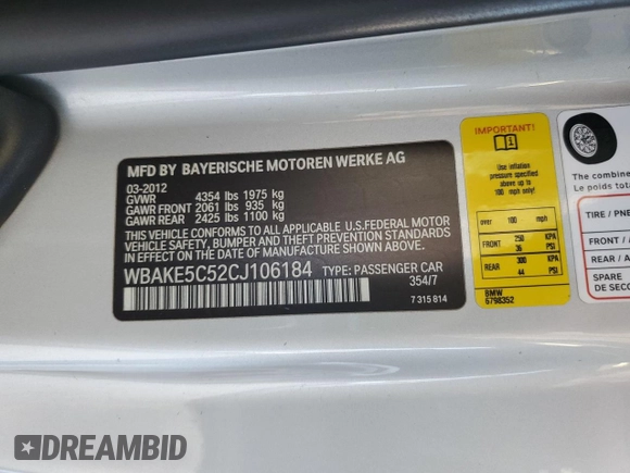 2012 BMW 3 Series 328i with VIN WBAKE5C52CJ106184, listed as a Copart auction lot 62584315 with 134,248 mi miles and Salvage title. Bid and sale history available at DreamBid. Image 12.