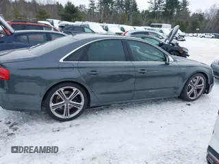 2014 Audi S8 with VIN WAUD2AFD8EN011752, listed as a IAAI auction lot 41556173 with 115,648 mi miles. Bid and sale history available at carsss.com. Image 14.