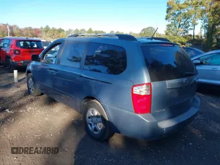 2009 Kia Sedona LX with VIN KNDMB233996320165, listed as a IAAI auction lot 40575451 with 122,057 mi miles. Bid and sale history available at carsss.com. Image 3.