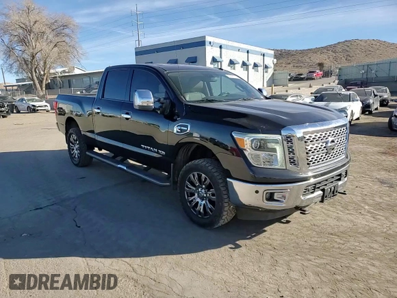 2017 Nissan Titan SL z VIN 1N6BA1F20HN522403, wystawiony jako Copart lot #87477114 z przebiegiem 98 084 mil mil oraz Szkoda całkowita • Salvage title. Historia ofert i sprzedaży dostępna na DreamBid. Obrazek 10.