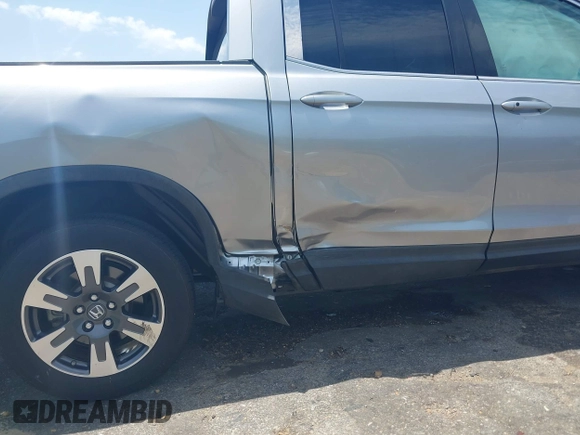 2018 Honda Ridgeline RTL z VIN 5FPYK2F5XJB001064, wystawiony jako IAAI lot #42252956 z przebiegiem 95 272 mil mil oraz . Historia ofert i sprzedaży dostępna na DreamBid. Obrazek 6.