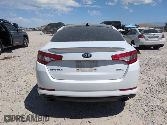 2013 Kia Optima SX с VIN 5XXGR4A6XDG091796, выставлен на аукционе Copart как лот 60294155 с пробегом Не указан миль и Списание • Salvage title. История ставок и продаж доступна на DreamBid. Изображение 6.