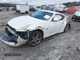 2012 Nissan 370Z Touring with VIN JN1AZ4EH4CM565125, listed as a IAAI auction lot 41630602 with 121,823 mi miles. Bid and sale history available at carsss.com. Image 2.