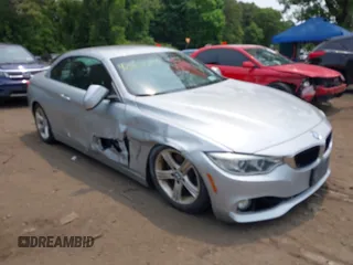 2015 BMW 4 Series 428i xDrive z VIN WBA3T1C58FP819868, wystawiony jako IAAI lot #42418432 z przebiegiem 54 686 mil mil oraz . Historia ofert i sprzedaży dostępna na DreamBid. Obrazek 1.