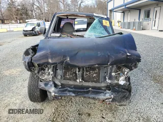 1999 Ford Ranger XL with VIN 1FTYR10C0XTA88744, listed as a Copart auction lot 44258415 with 202,709 mi miles and Salvage title. Bid and sale history available at DreamBid. Image 5.