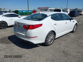 2015 Kia Optima LX with VIN 5XXGM4A70FG470686, listed as a IAAI auction lot 41828763 with 133,547 mi miles. Bid and sale history available at carsss.com. Image 4.