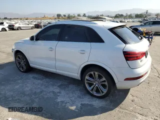 2015 Audi Q3 Prestige with VIN WA1FFCFS5FR008970, listed as a Copart auction lot 63481644 with 103,795 mi miles and Salvage title. Bid and sale history available at DreamBid. Image 2.