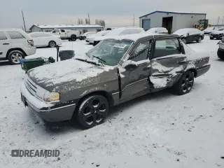 1990 Ford Tempo z VIN 1FAPP36X4LK167346, wystawiony jako Copart lot #84089494 z przebiegiem 66 291 mil mil oraz Szkody całkowita. Historia ofert i sprzedaży dostępna na DreamBid. Obrazek 1.