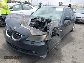 2007 BMW 5 Series 530i with VIN WBANE73577CM57997, listed as a IAAI auction lot 41461292 with 220,424 mi miles. Bid and sale history available at carsss.com. Image 2.