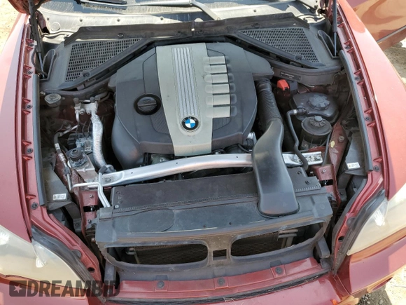 2011 BMW X5 35d with VIN 5UXZW0C56BL661903, listed as a Copart auction lot 62216795 with 146,045 mi miles and Clean title. Bid and sale history available at DreamBid. Image 12.