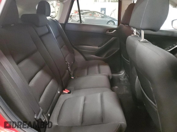 2016 Mazda CX-5 Touring z VIN JM3KE4CY7G0898598, wystawiony jako Copart lot #56717895 z przebiegiem 103 548 mil mil oraz Szkoda całkowita • Salvage title. Historia ofert i sprzedaży dostępna na DreamBid. Obrazek 11.