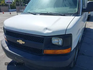 2014 Chevrolet Express Cargo with VIN 1GCSGAFXXE1200920, listed as a IAAI auction lot 42637911 with 205,182 mi miles and . Bid and sale history available at DreamBid. Image 6.