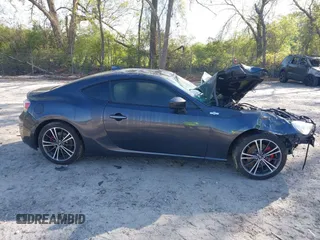 2015 Scion FR-S with VIN JF1ZNAA10F8707671, listed as a IAAI auction lot 42000130 with 136,734 mi miles. Bid and sale history available at carsss.com. Image 13.