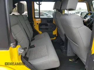 2009 Jeep Wrangler Unlimited Rubicon with VIN 1J8GA69109L761089, listed as a Copart auction lot 57975985 with 195,530 mi miles and Salvage title. Bid and sale history available at DreamBid. Image 11.