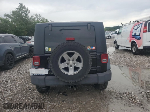 2010 Jeep Wrangler Rubicon with VIN 1J4BA6D14AL198524, listed as a Copart auction lot 65260235 with Not provided miles and Clean title. Bid and sale history available at DreamBid. Image 7.