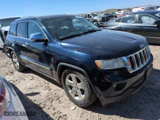 2012 Jeep Grand Cherokee Overland with VIN 1C4RJFCG5CC298516, listed as a Copart auction lot 53164465 with 232,575 mi miles and Clean Title. Bid and sale history available at carsss.com. Image 4.