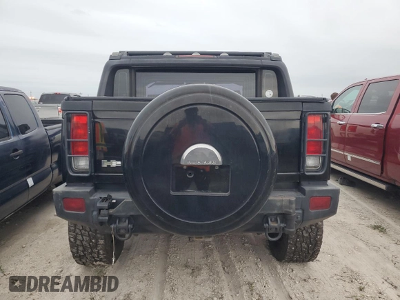 2006 Hummer H2 with VIN 5GRGN22U06H117601, listed as a Copart auction lot 76276744 with 0 mi miles and Non Repairable. Bid and sale history available at carsss.com. Image 6.