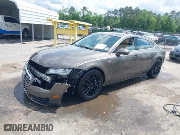 2012 Audi A7 Premium Plus with VIN WAUYGAFC1CN085666, listed as a IAAI auction lot 42177867 with 242,775 mi miles and . Bid and sale history available at DreamBid. Image 2.