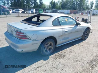 1994 Ford Mustang with VIN 1FALP4041RF171911, listed as a IAAI auction lot 42705975 with 292,952 mi miles and . Bid and sale history available at DreamBid. Image 4.