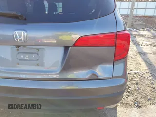 2016 Honda Pilot EX-L z VIN 5FNYF5H54GB041614, wystawiony jako IAAI lot #41505898 z przebiegiem Nie podano mil oraz . Historia ofert i sprzedaży dostępna na DreamBid. Obrazek 18.